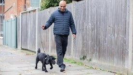 Buddy and owner on a walk